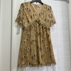 Lacey floral feminine neutral tone dress. Fully lined